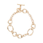 Gold handmade chain bracelet on a white background
